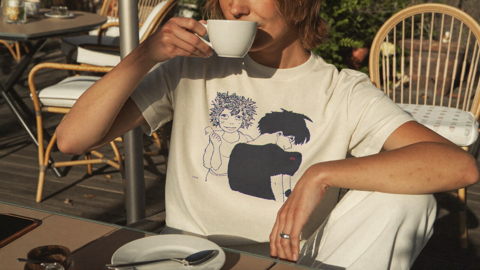 Anime-inspired 2d anime t-shirt styled in a natural daylight scene