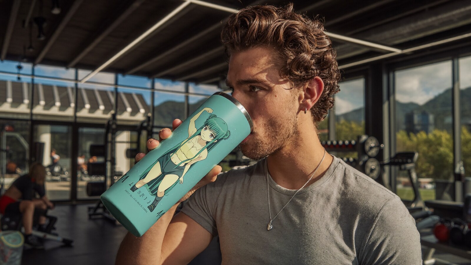 Anime-inspired 40 oz tumblers in a social or layered scene with friends