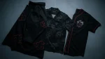 Flat-lay of dark Akatsuki shirt apparel with red cloud accents, cloak coat, Hawaiian shirt and jersey