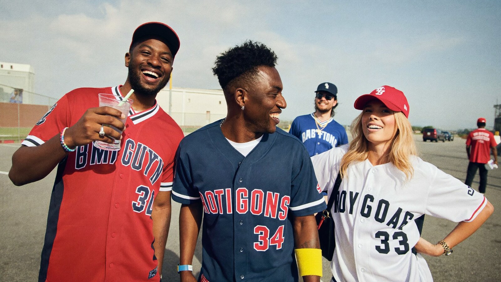 Anime-inspired baseball jerseys in a social or layered scene with friends