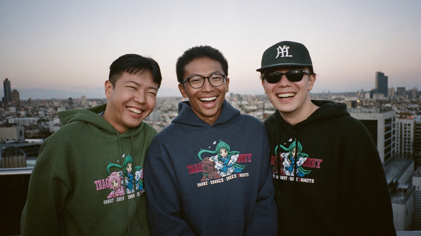 Anime-inspired embroidered hoodie in a social or layered scene with friends