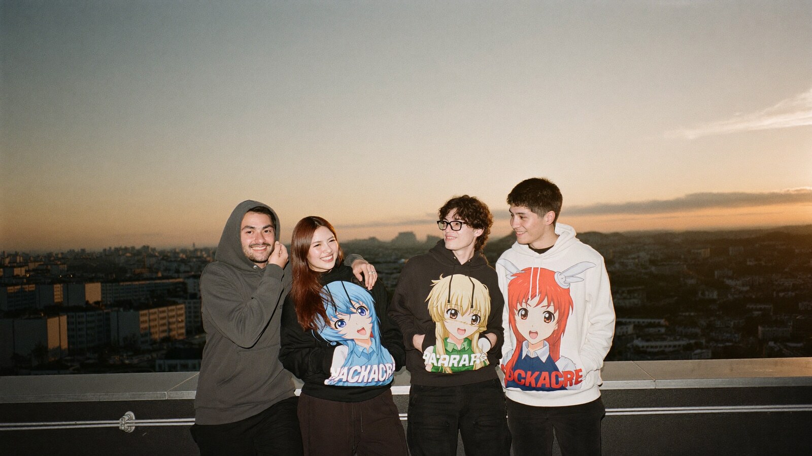 Anime-inspired hoodies in a social or layered scene with friends