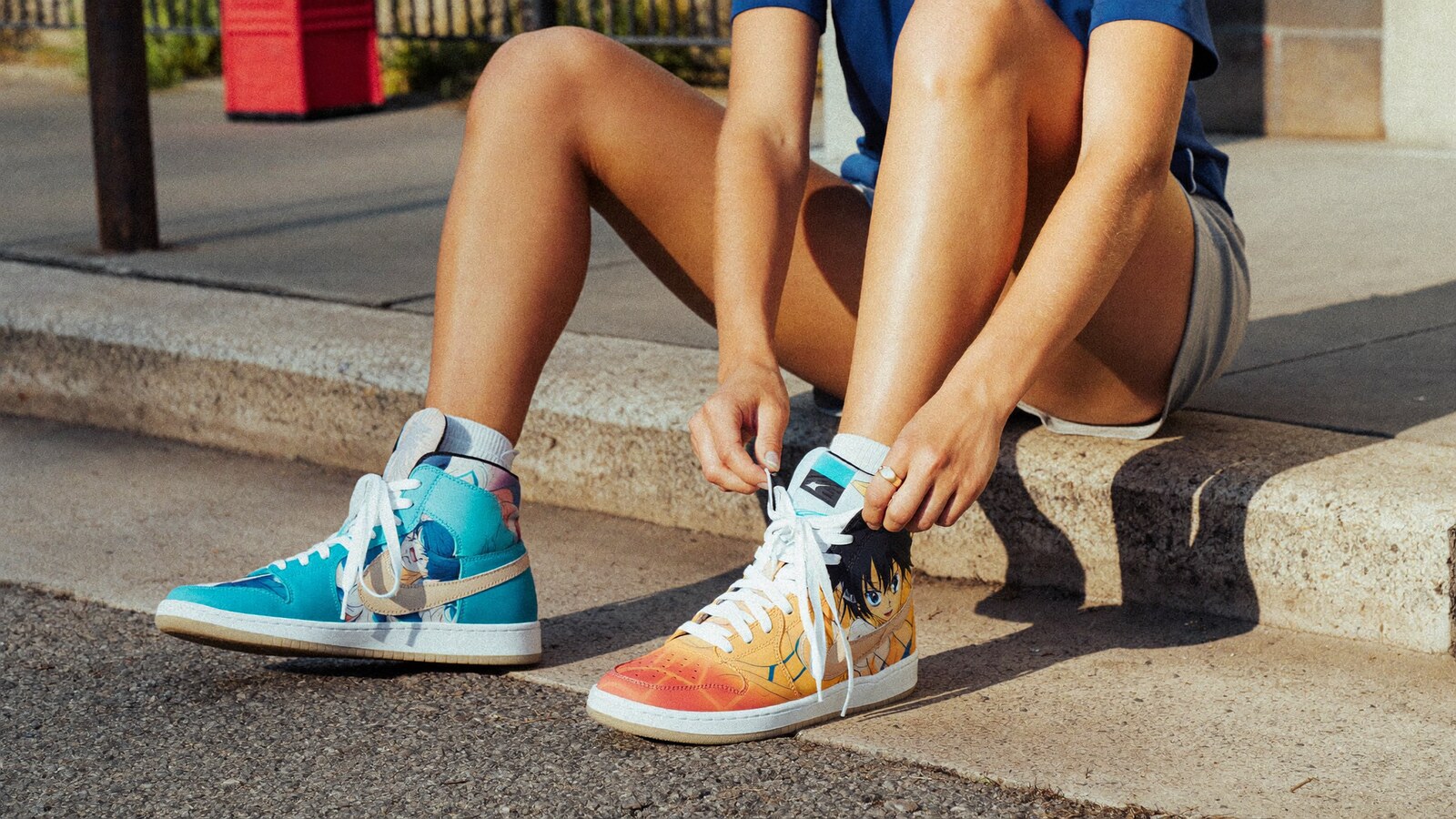 Anime-inspired mid 1 basketball shoes styled in a natural daylight scene