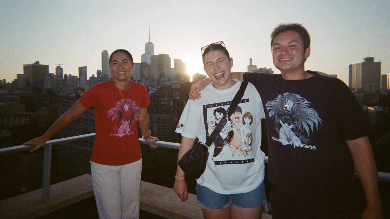Anime-inspired anime t-shirts in a social or layered scene with friends