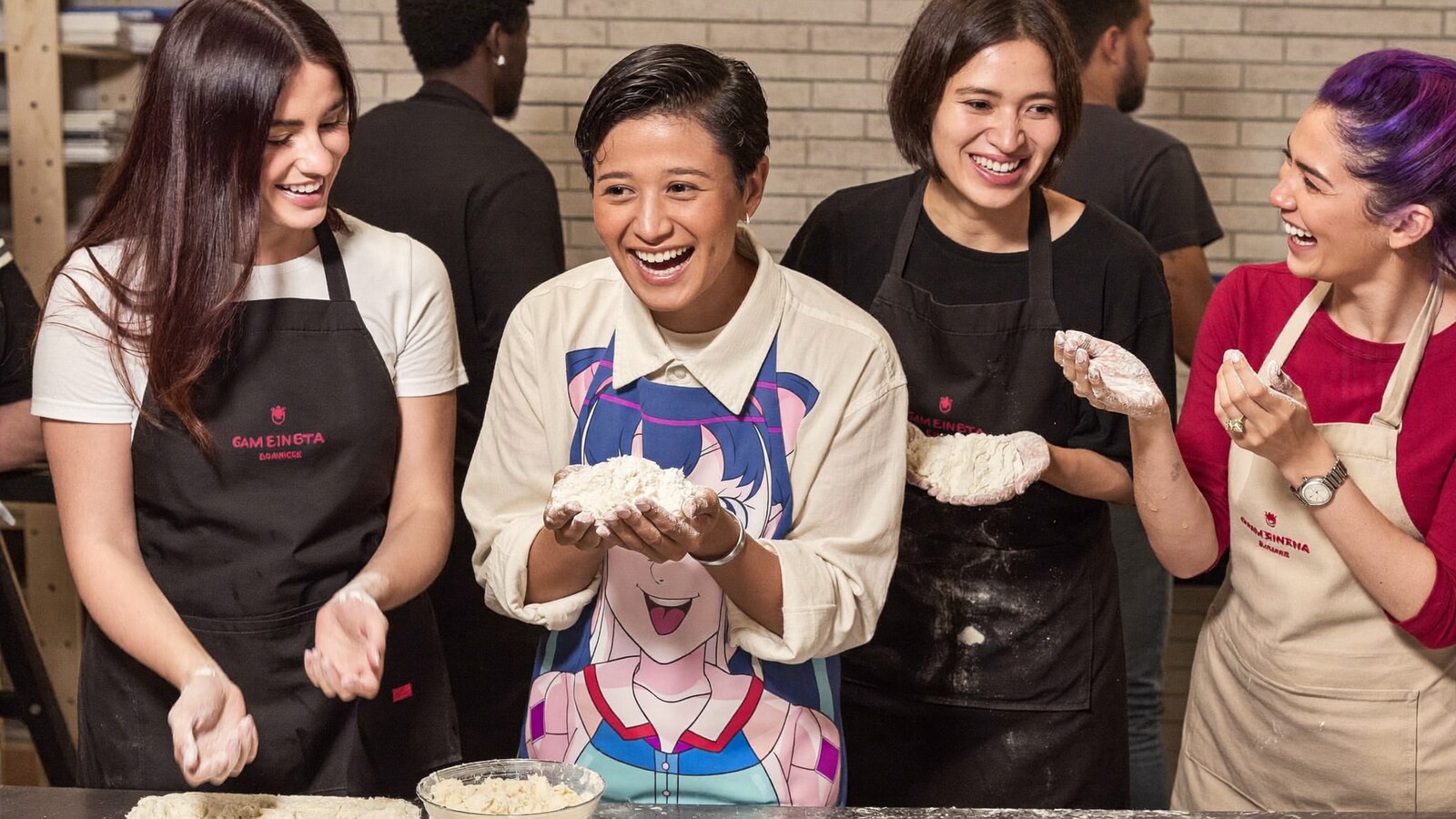 Anime-inspired aprons in a social or layered scene with friends