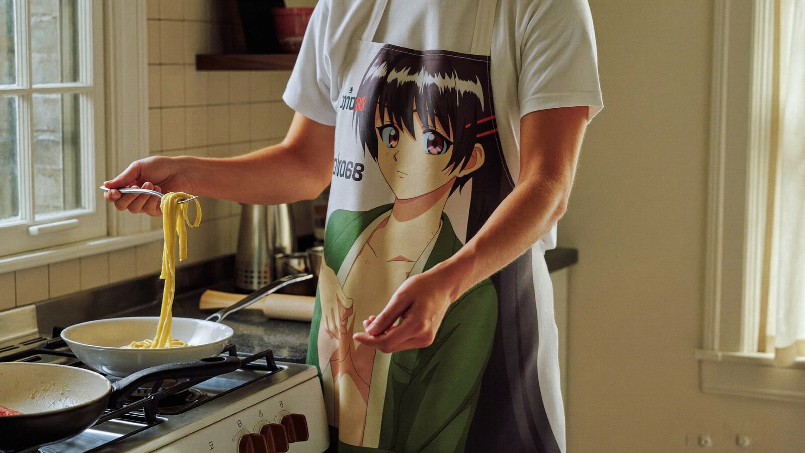 Person wearing an anime-inspired aprons in an editorial scene
