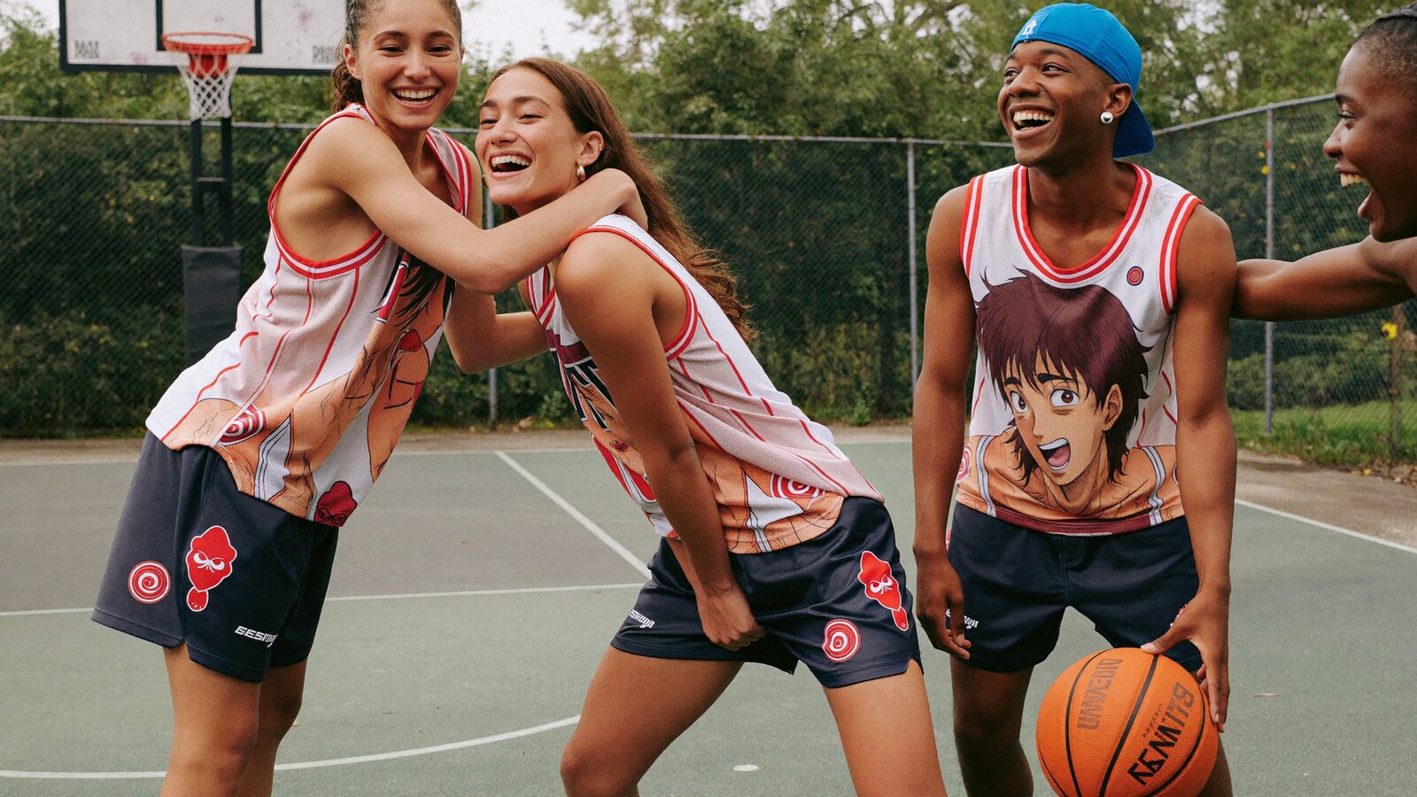 Anime-inspired basketball shorts in a social or layered scene with friends