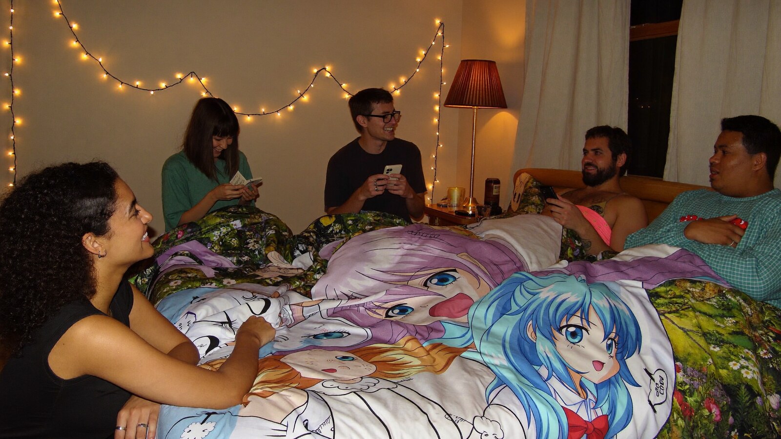 Anime-inspired bedding sets in a social or layered scene with friends