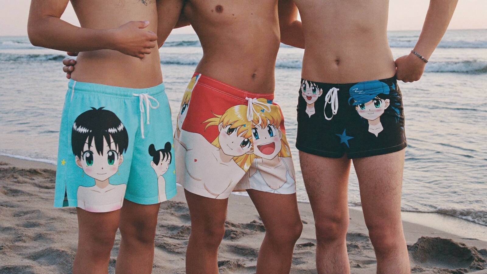 Anime-inspired board shorts swim trunks in a social or layered scene with friends
