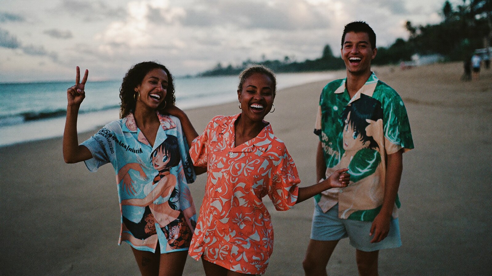 Anime-inspired button up hawaiian shirts in a social or layered scene with friends