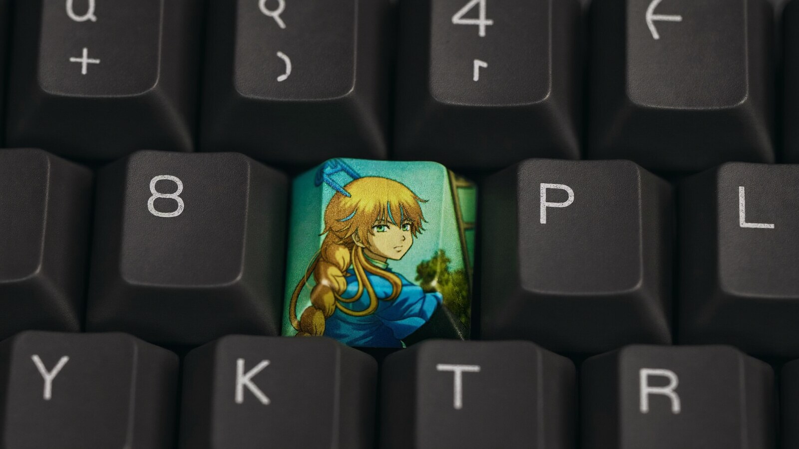 Person wearing an anime-inspired capslock keycap in an editorial scene