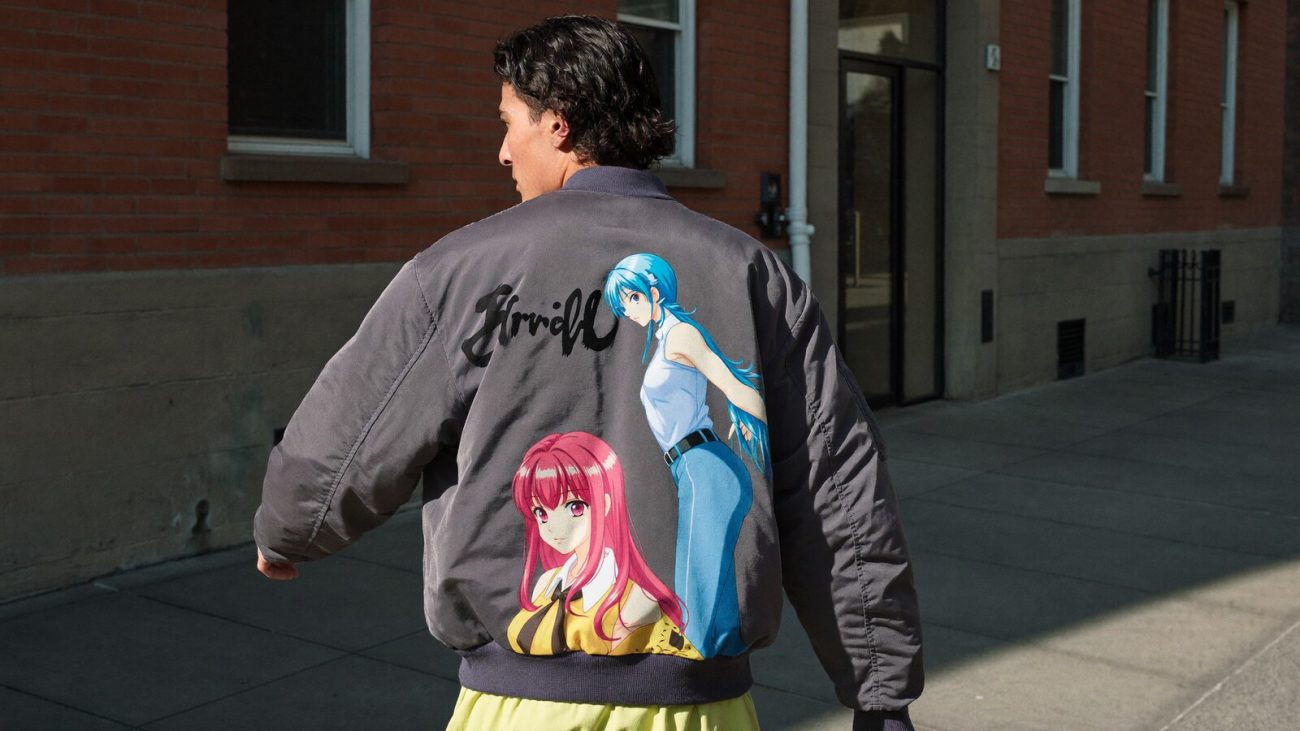 Person wearing an anime-inspired casual bomber jacket in an editorial scene