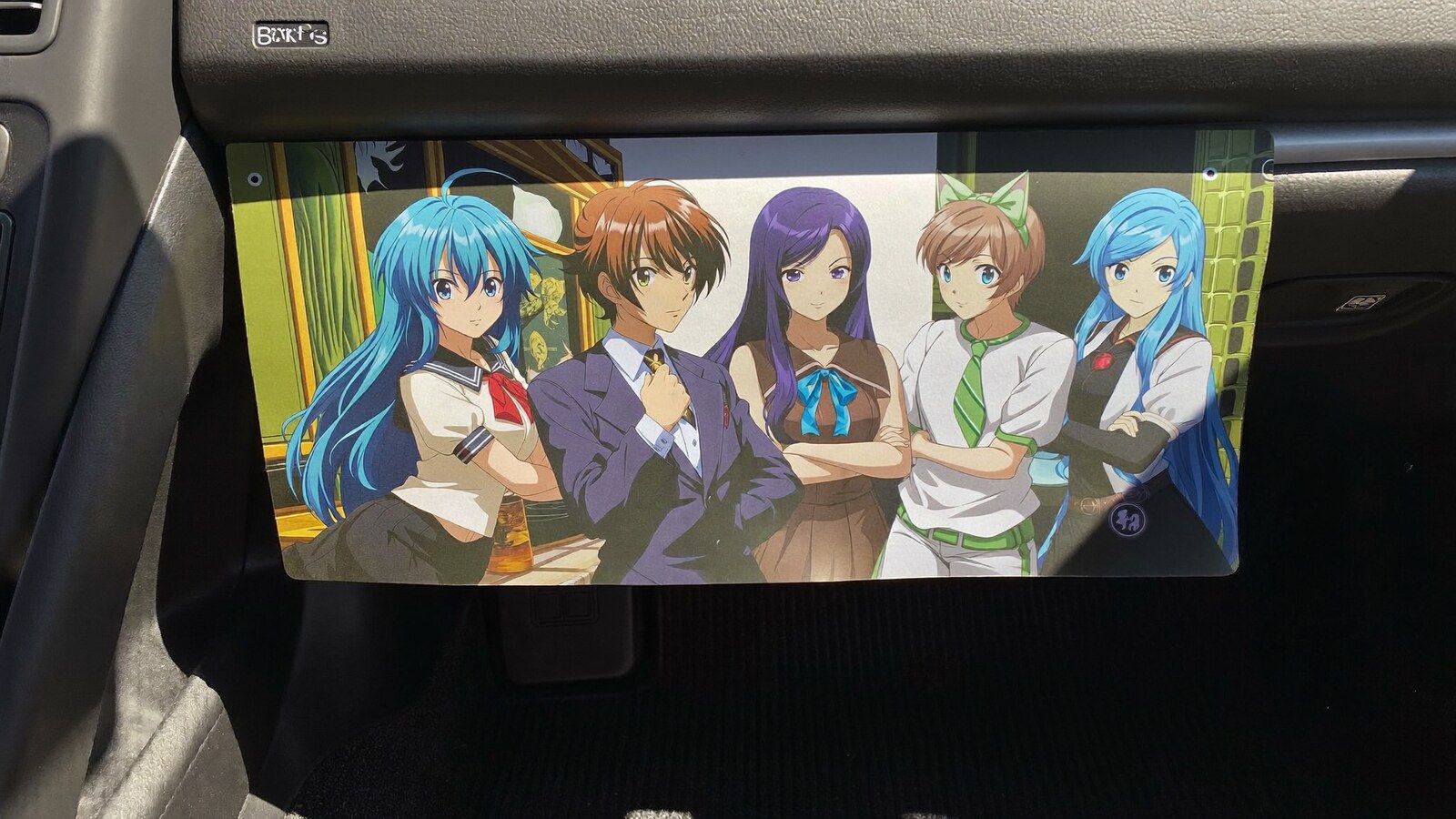 Anime-inspired center console cover car accessories styled in a cinematic scene