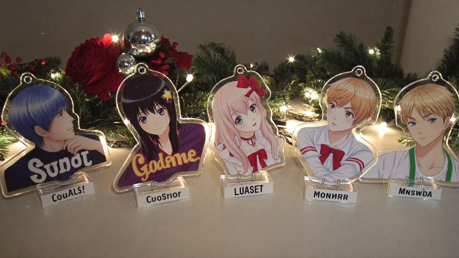 Anime-inspired custom couple name christmas acrylic ornaments in a social or layered scene with friends