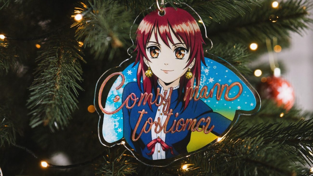 Person wearing an anime-inspired custom name christmas acrylic ornaments in an editorial scene