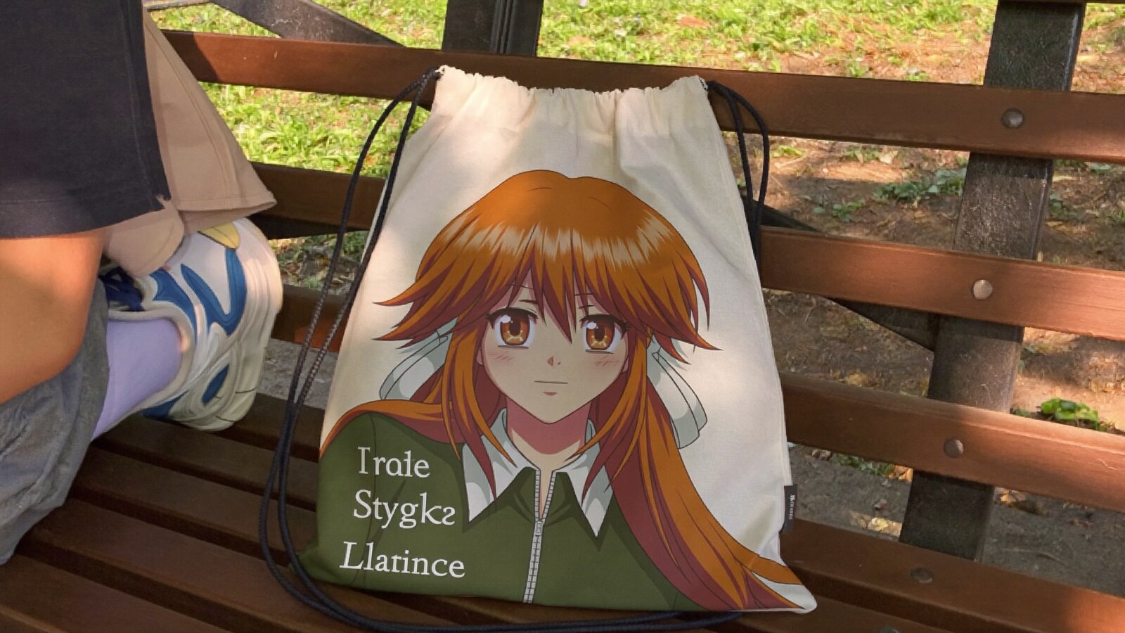 Anime-inspired drawstring bags styled in a natural daylight scene