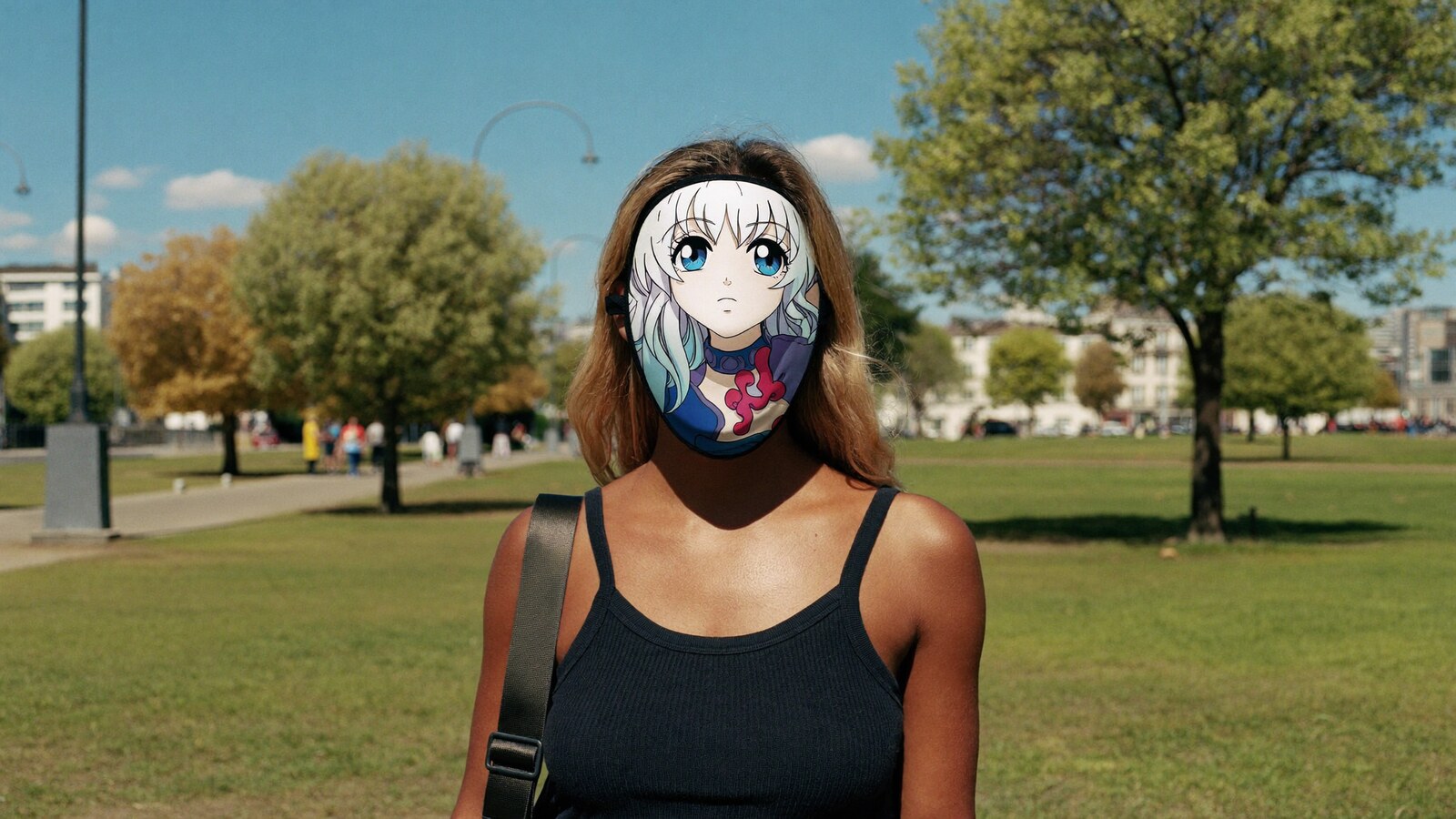 Person wearing an anime-inspired face masks in an editorial scene