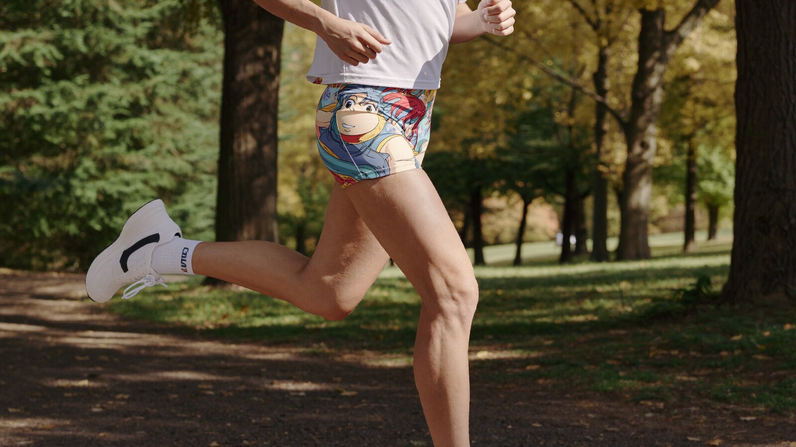 Anime-inspired gym shorts styled in a natural daylight scene