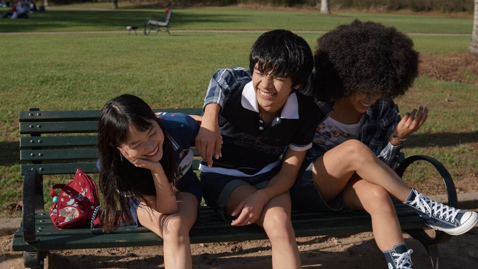 Anime-inspired high top canvas shoes in a social or layered scene with friends