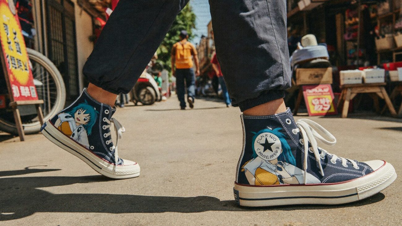 Person wearing an anime-inspired high top canvas shoes in an editorial scene