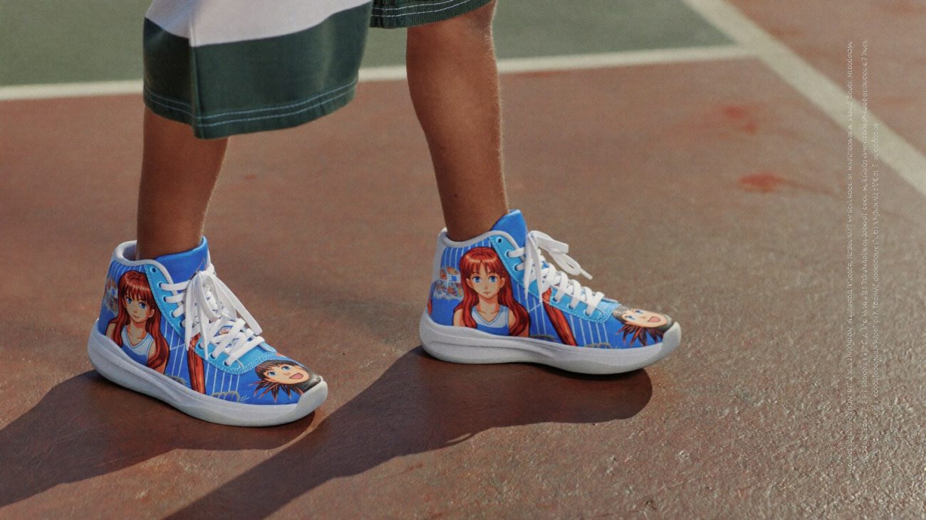 Person wearing an anime-inspired kids mid 1 basketball shoes in an editorial scene