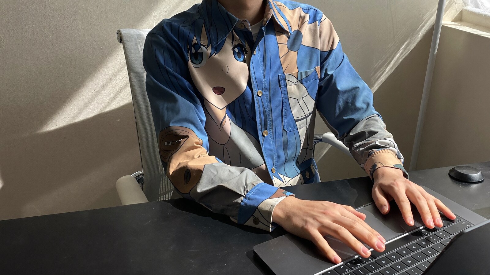 Anime-inspired long sleeve button up shirt styled in a natural daylight scene