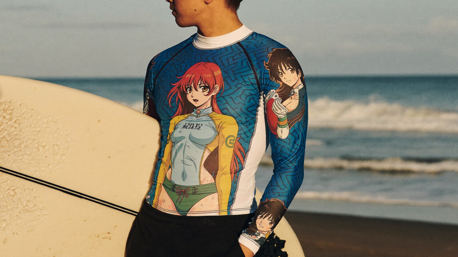Person wearing an anime-inspired long sleeve rash guard compression shirts in an editorial scene