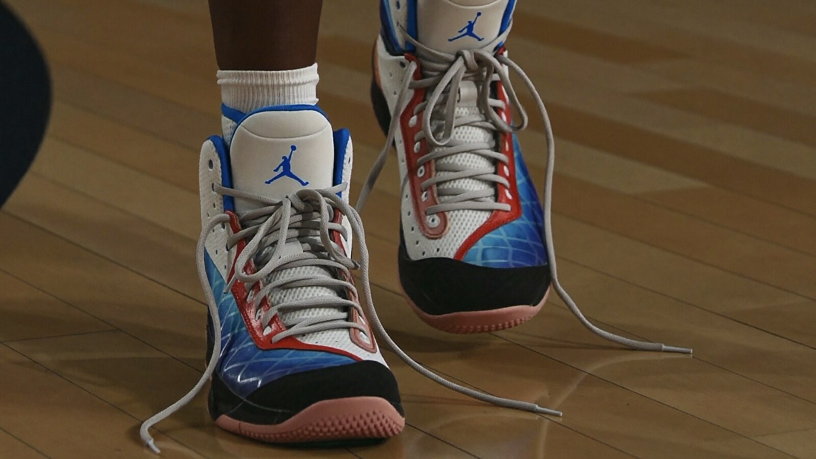 Anime-inspired mid 11 basketball shoes styled in a natural daylight scene