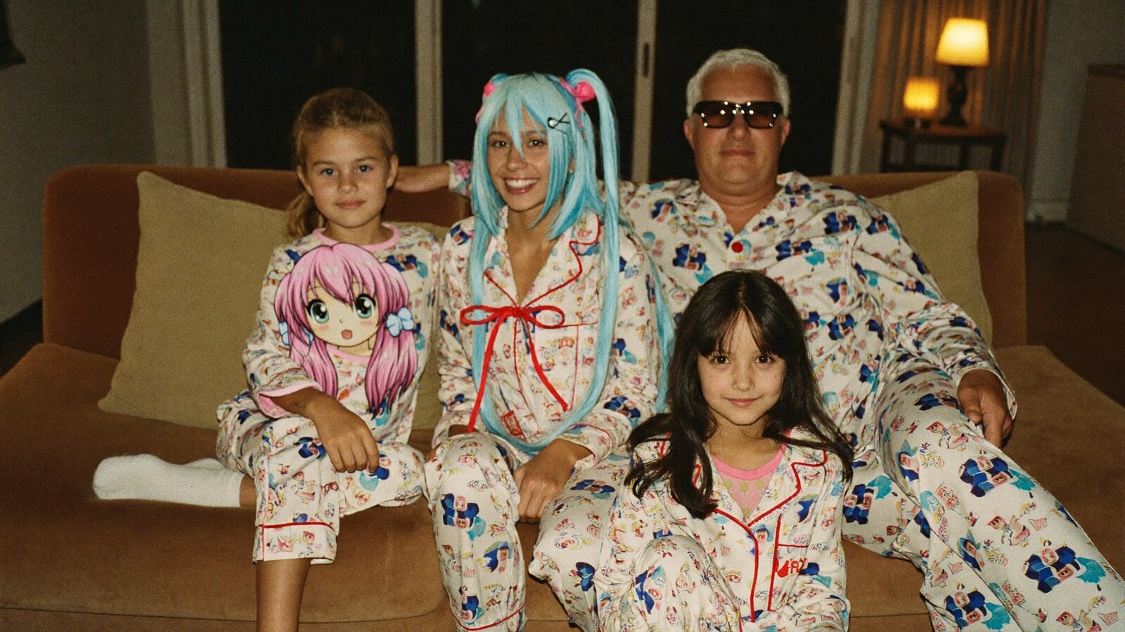 Anime-inspired pajamas in a social or layered scene with friends