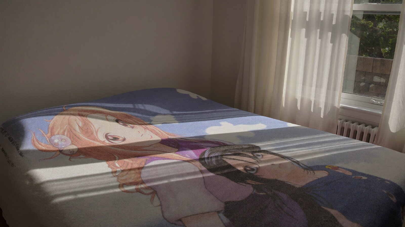 Anime-inspired quilts blanket styled in a cinematic scene