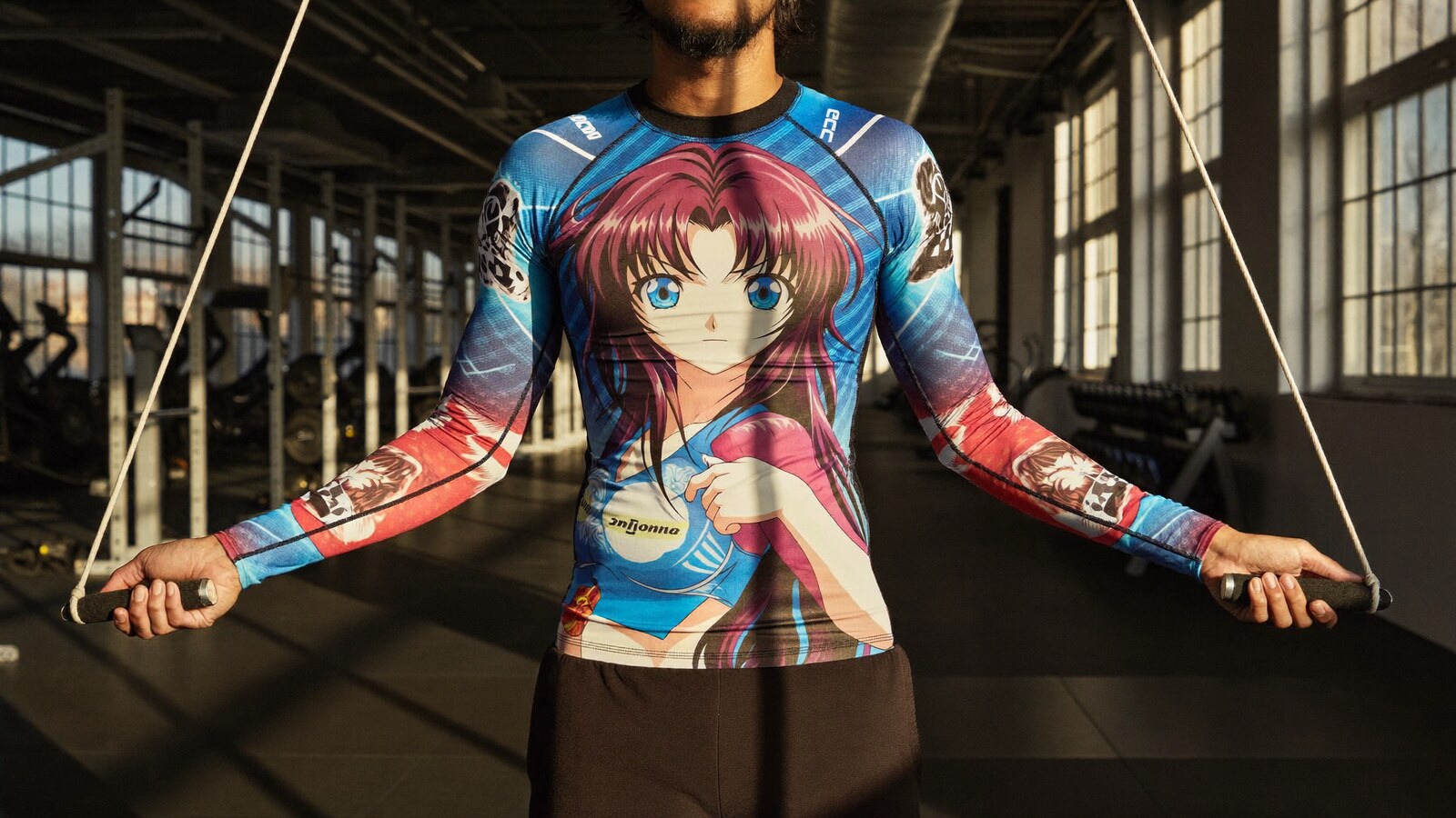 Anime-inspired rash guard compression shirts styled in a natural daylight scene
