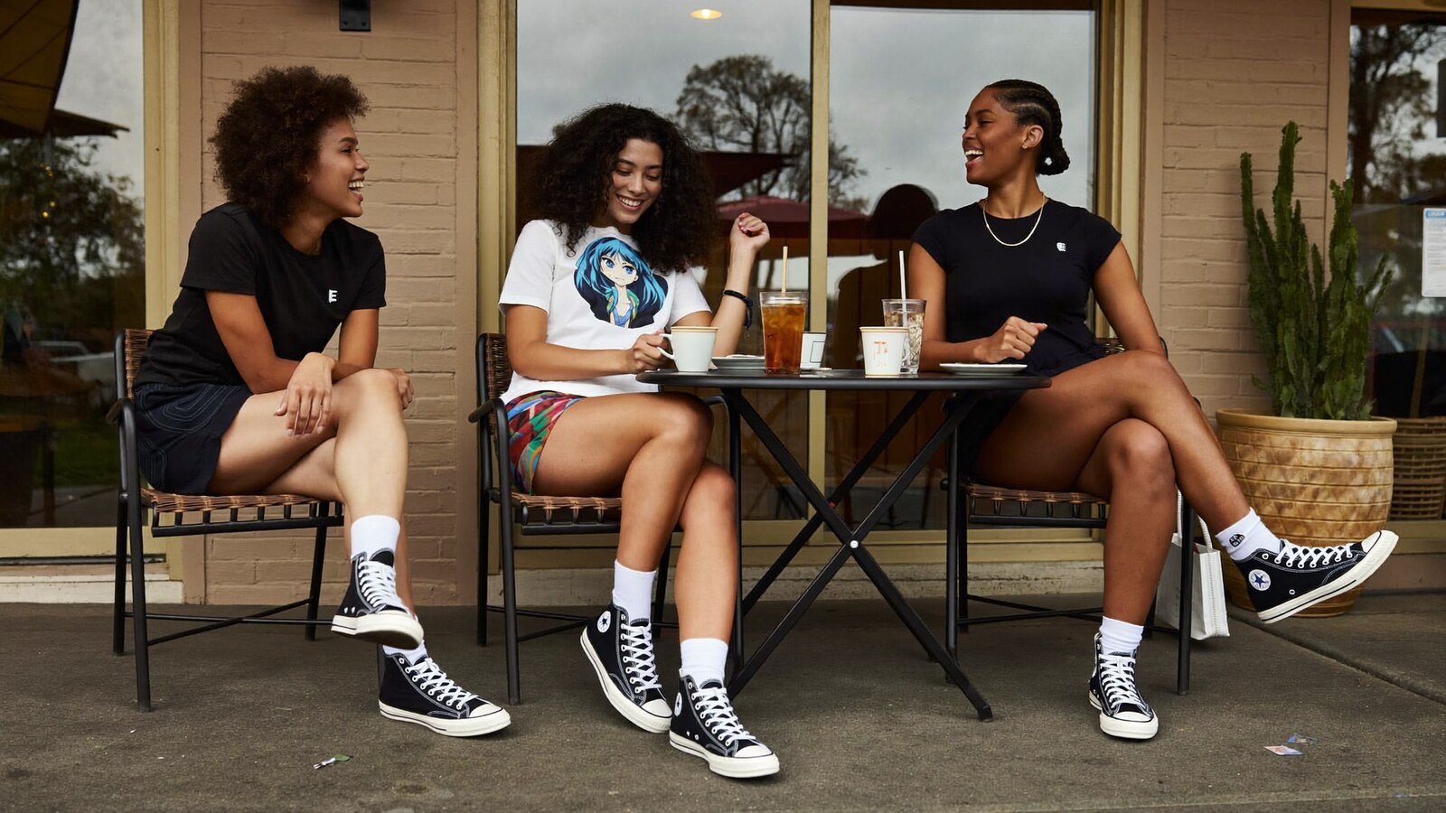 Anime-inspired s1 shoes in a social or layered scene with friends