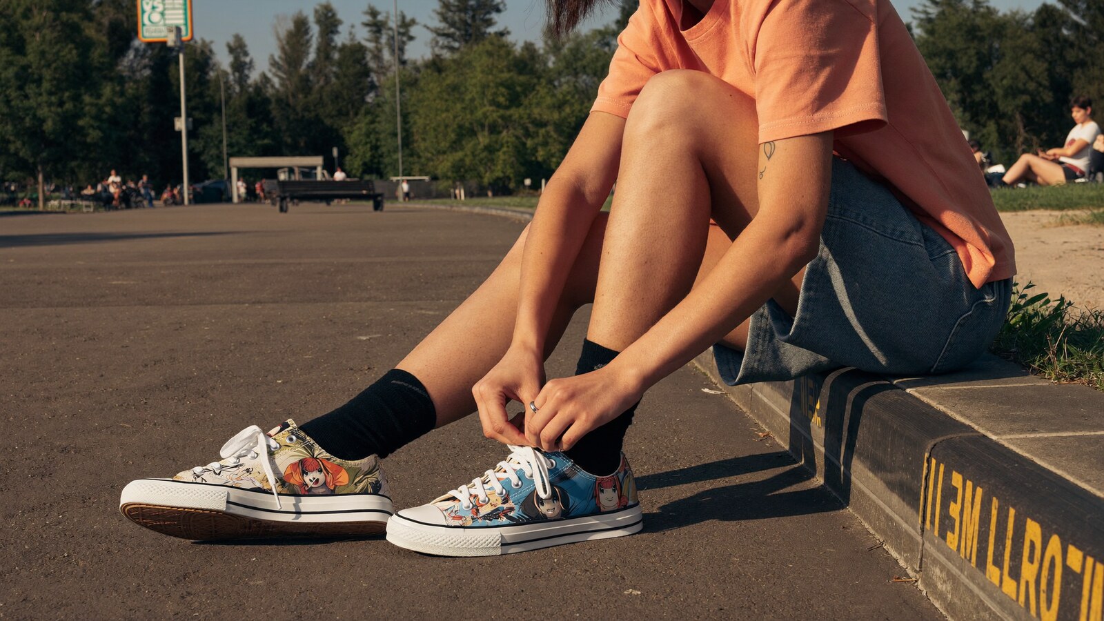 Anime-inspired shoes styled in a natural daylight scene