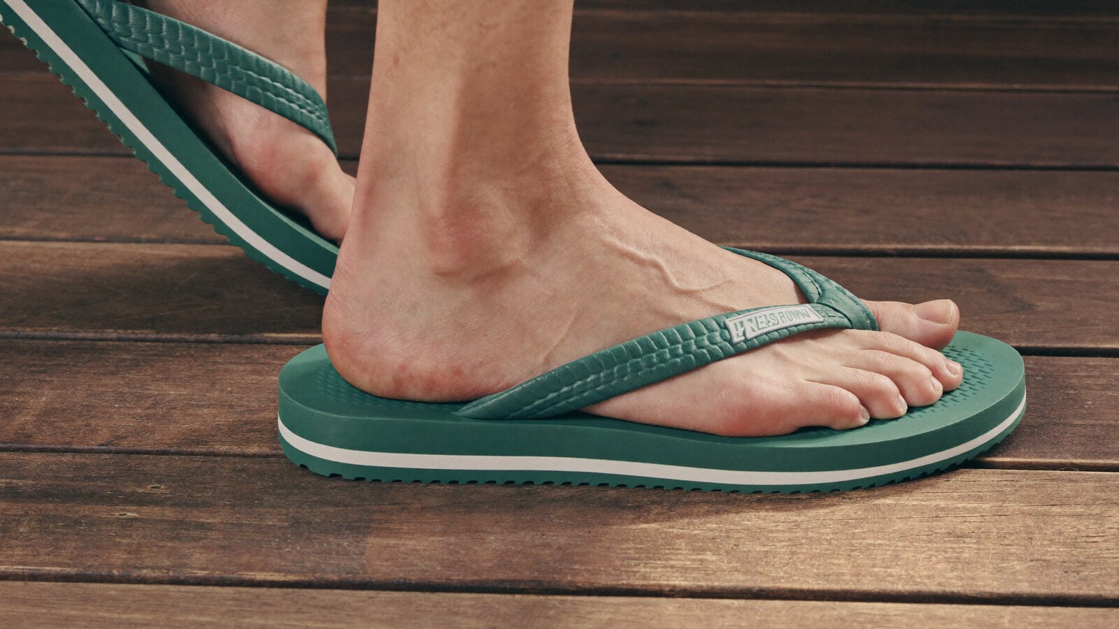 Anime-inspired flip flops styled in a natural daylight scene