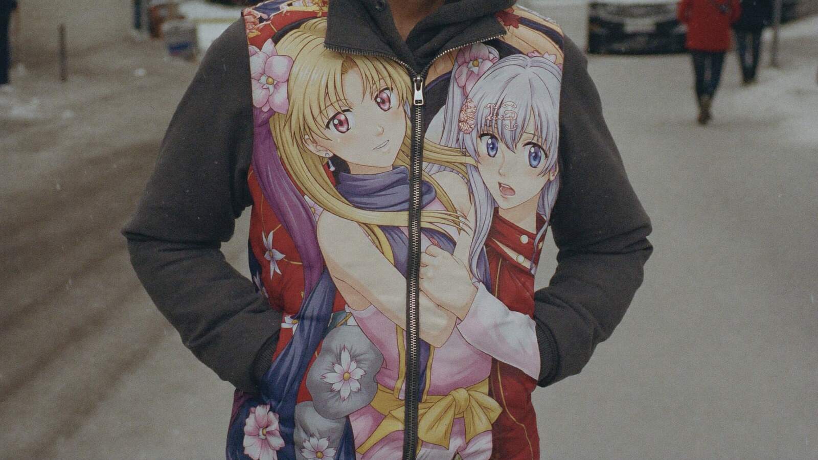 Person wearing an anime-inspired sleeveless down jacket in an editorial scene