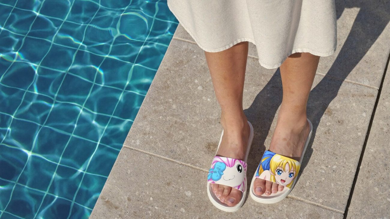 Person wearing an anime-inspired slides in an editorial scene