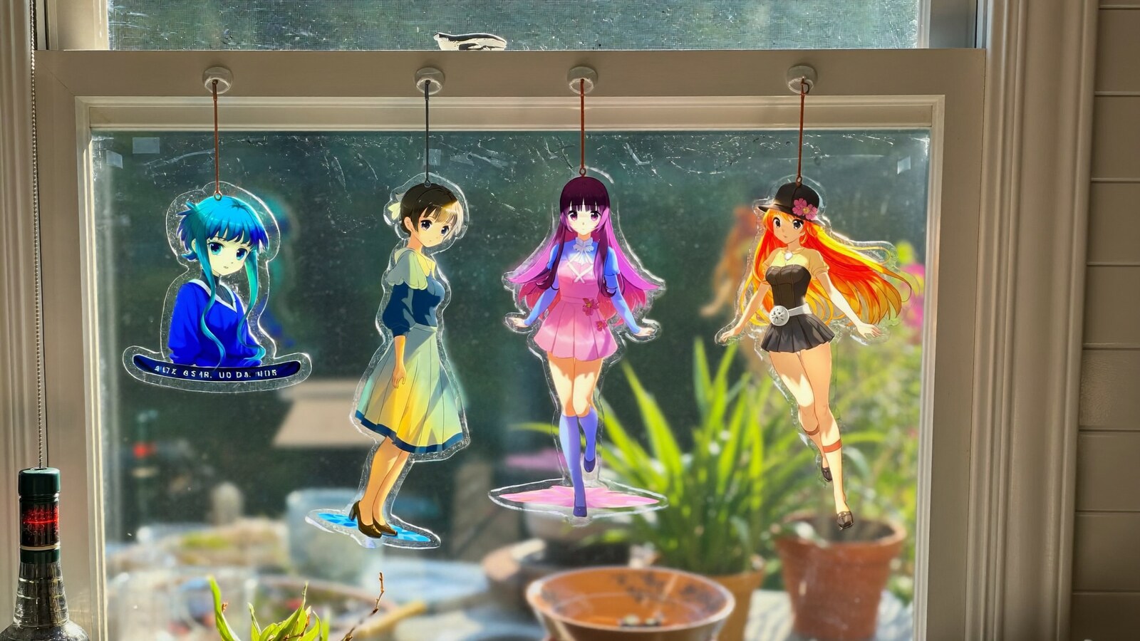 Anime-inspired stained glass suncatchers styled in a cinematic scene