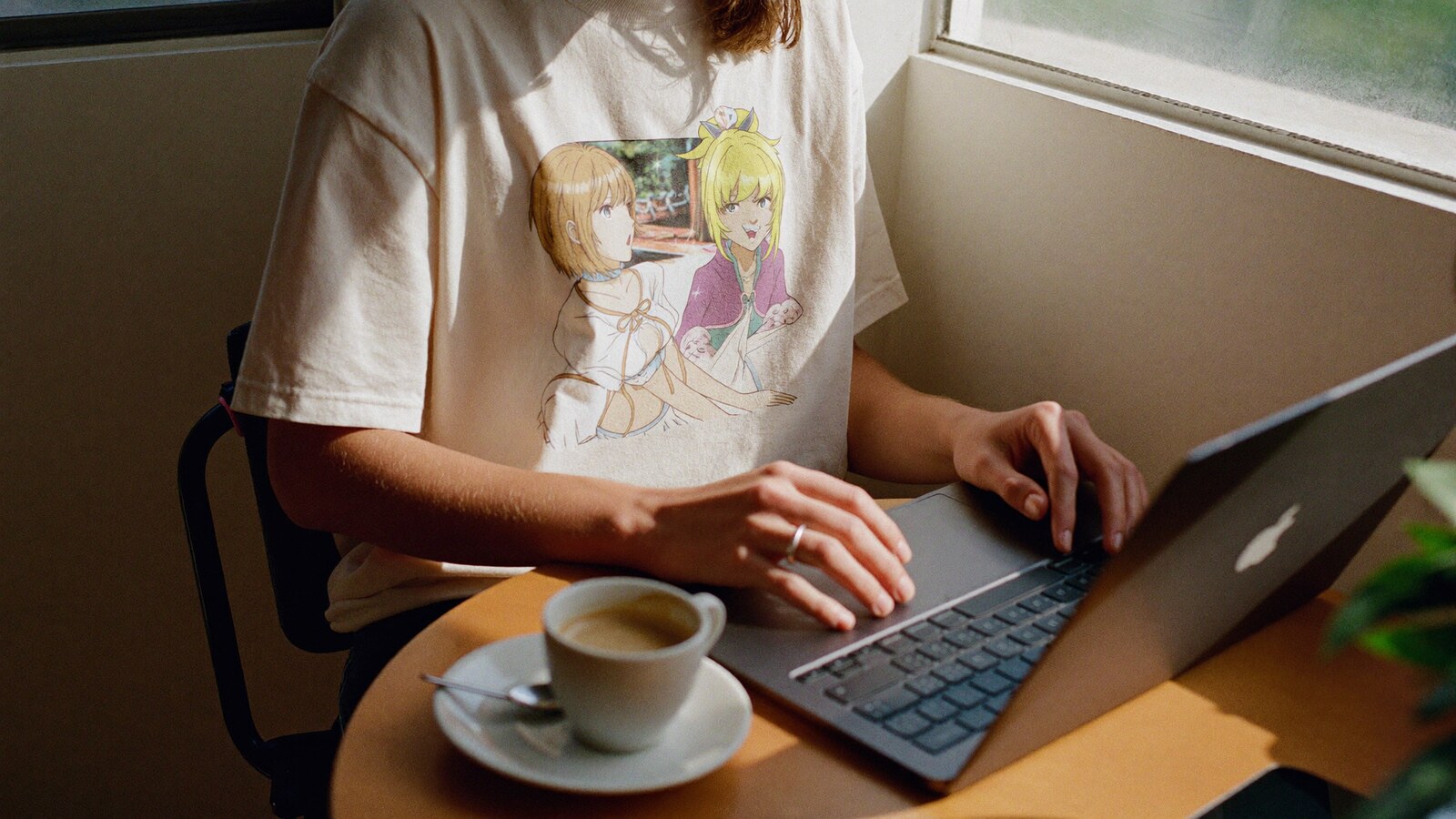 Anime-inspired streetwear t-shirts styled in a natural daylight scene
