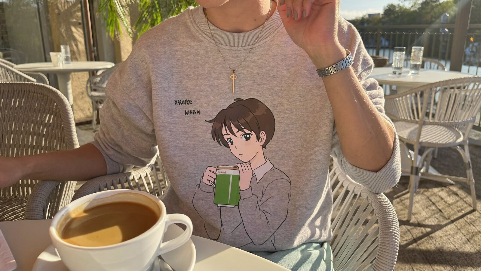 Anime-inspired sweatshirts styled in a natural daylight scene