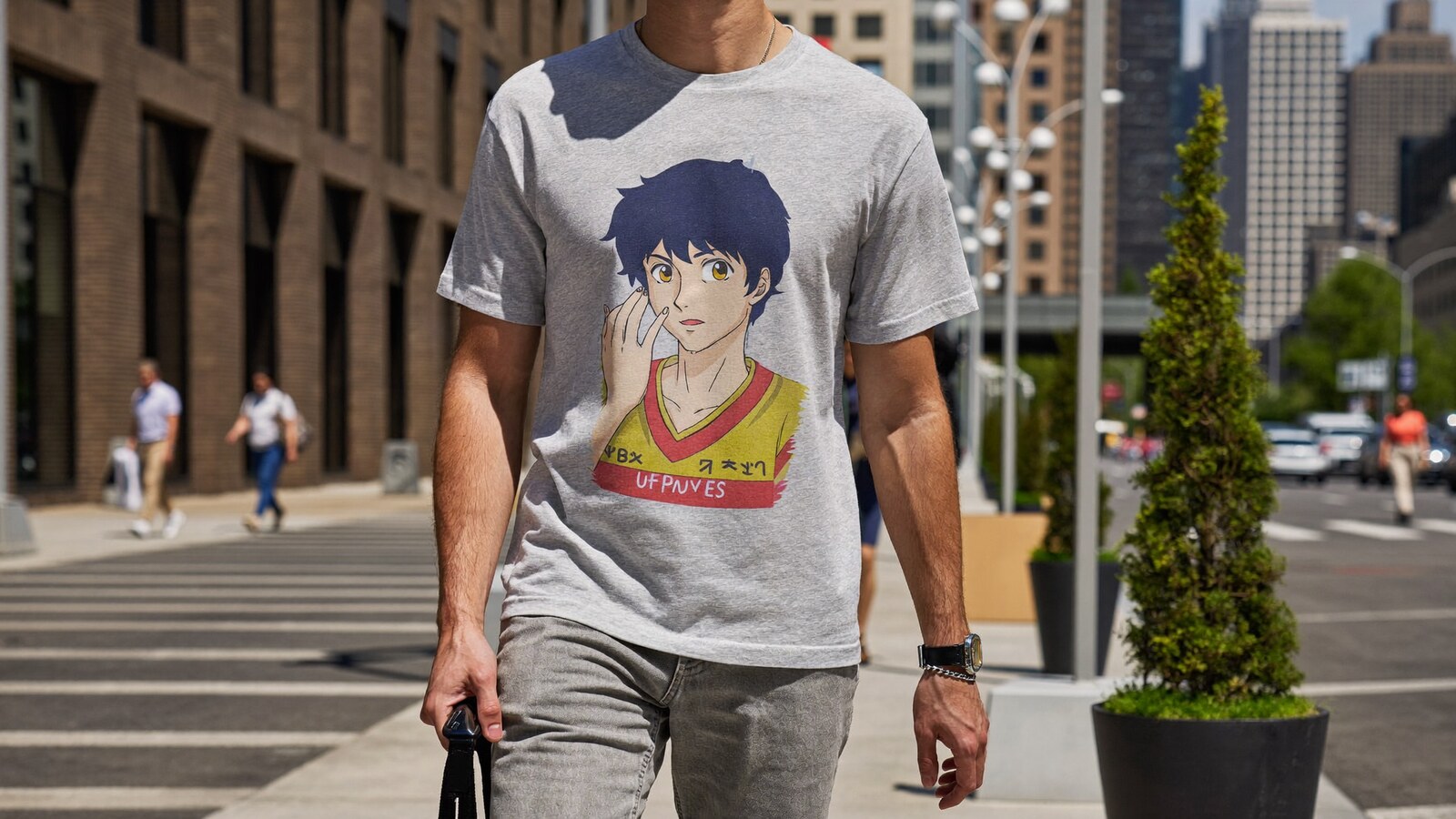 Person wearing an anime-inspired t-shirt in an editorial scene