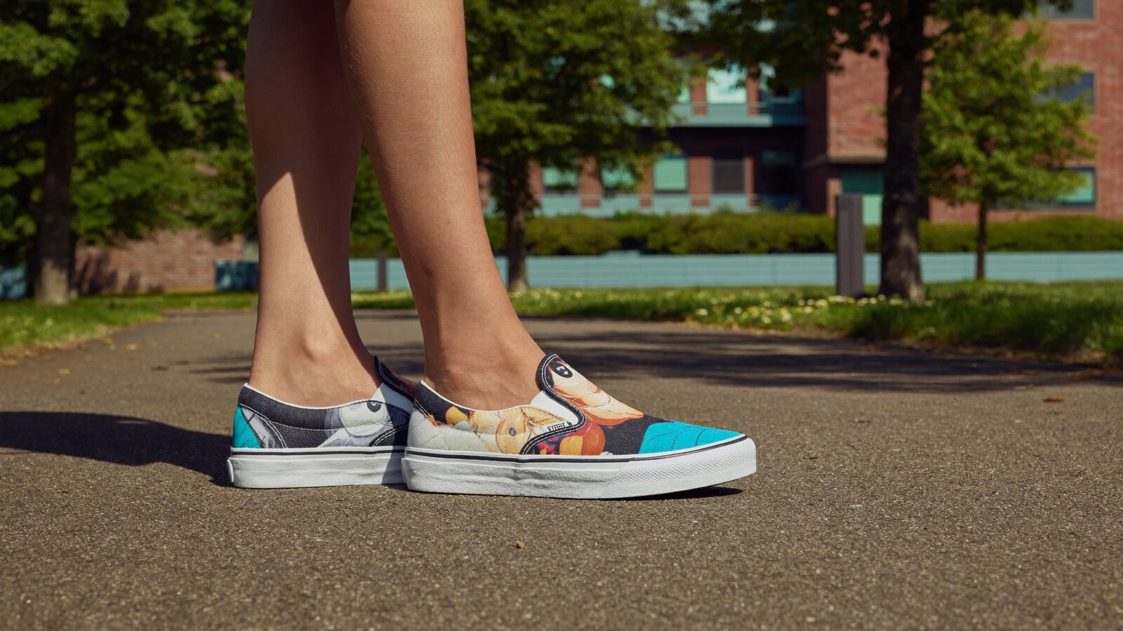 Person wearing an anime-inspired tomu canvas shoes in an editorial scene