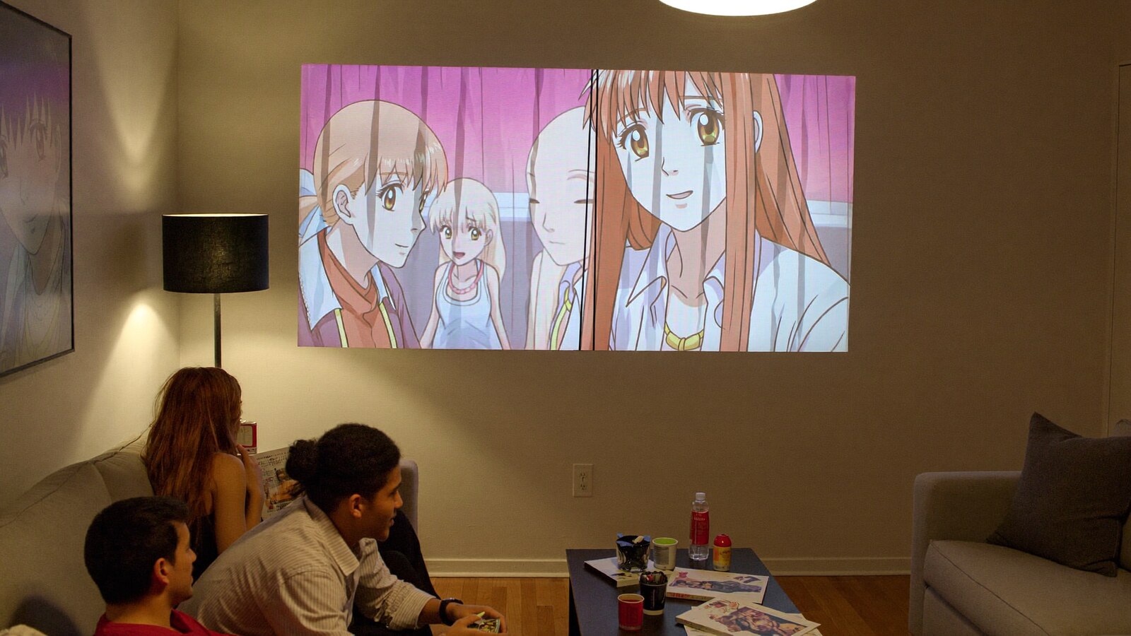 Anime-inspired window curtain in a social or layered scene with friends