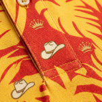 Macho Man Cream of the Crop wrestling polo shirt — fabric macro detail of polyester pique knit