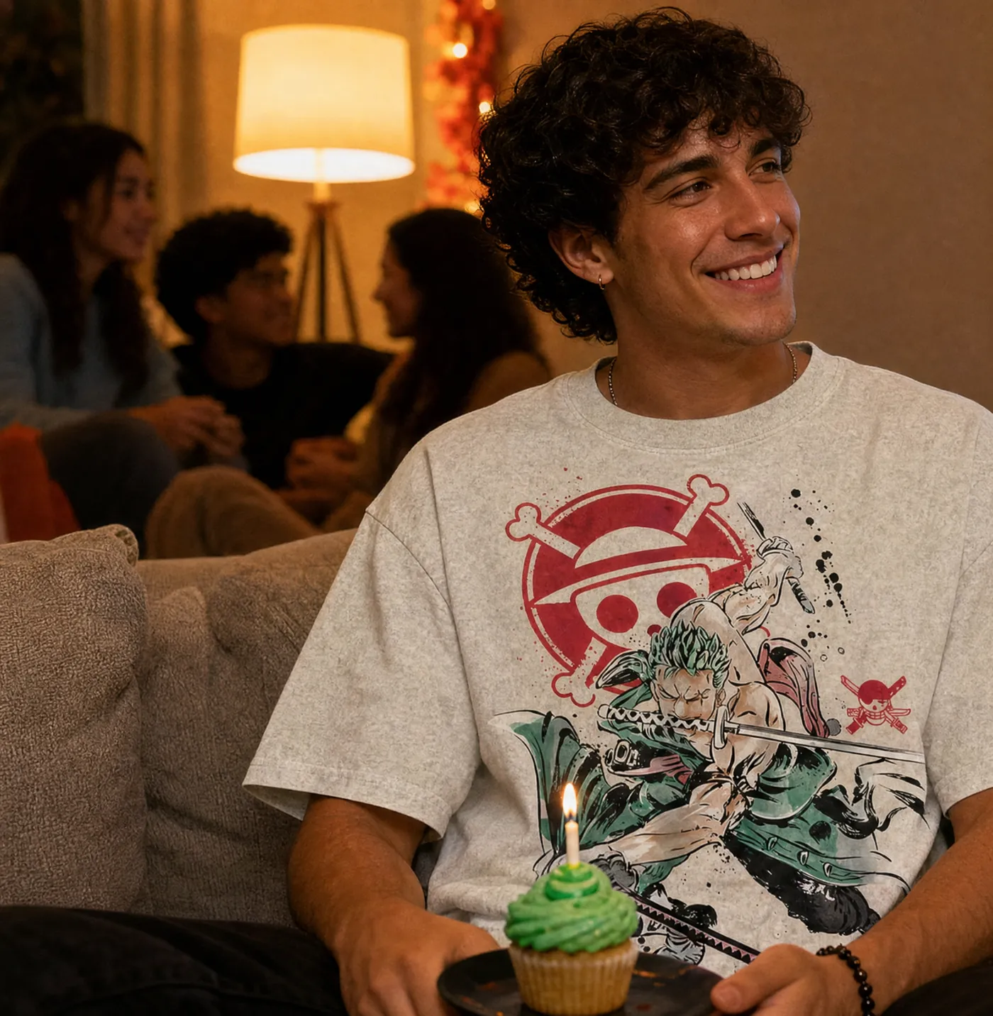 Fan in a Roronoa Zoro One Piece vintage tee with a green birthday cupcake